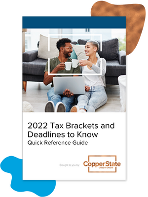 2022-tax-brackets-couple-with-coffee-on-computer 2022-tax-brackets-couple-with-coffee-on-computer