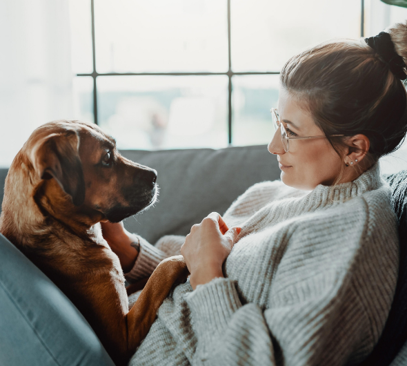 girl-and-dog-on-couch