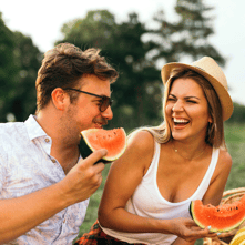 couple eating watermelon