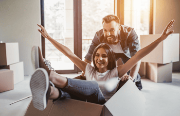 happy-couple-having-fun-on-moving-day