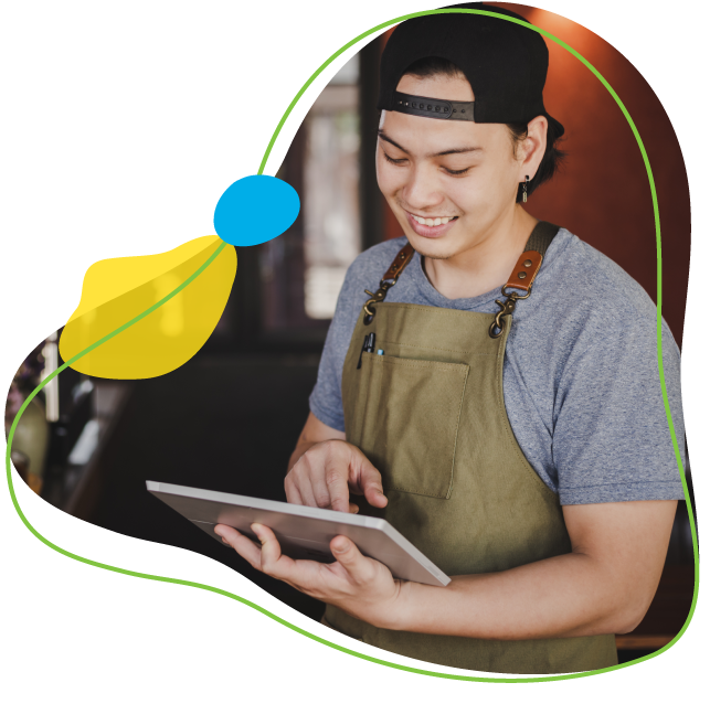 business owner holding a tablet