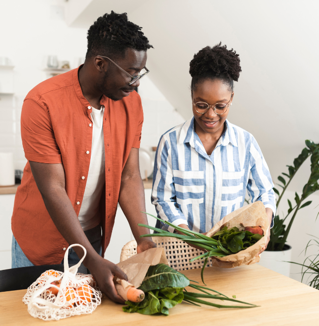 Couple putting away groceries  (643 x 657 px)