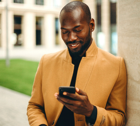 Man Looking at His Phone