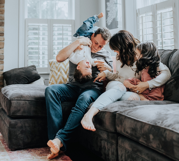 Family Sitting Together on the Couch