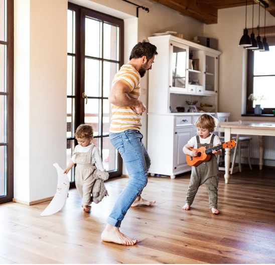 Family playing in newly purchased home.
