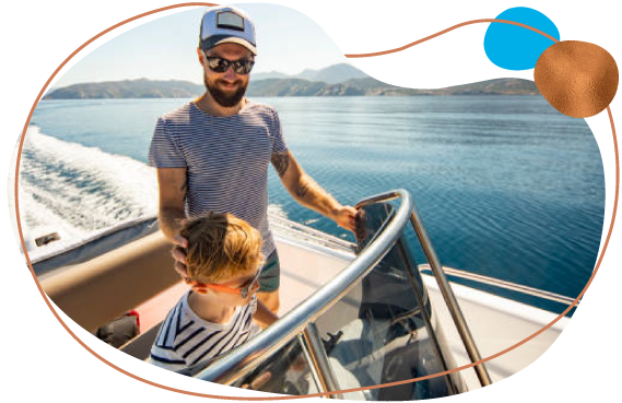 father with son in boat