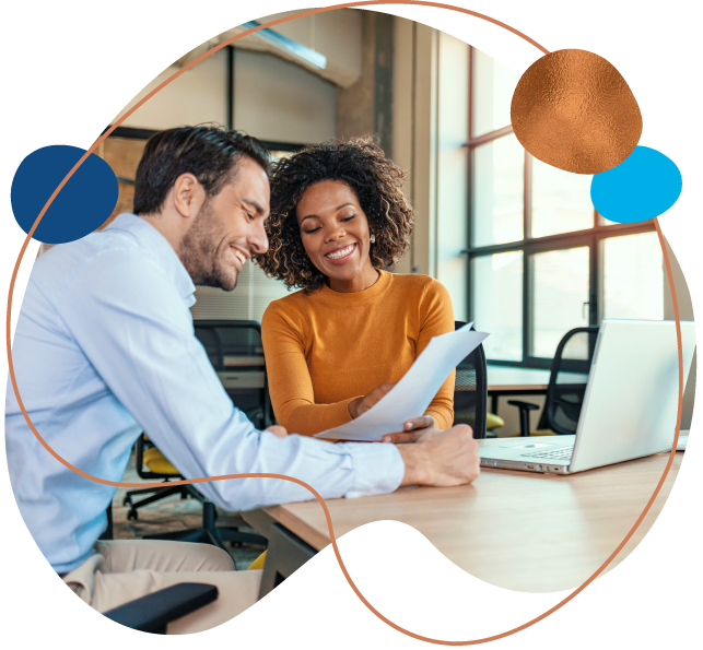 business man and business woman reviewing paperwork