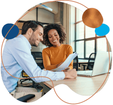 business man and business woman reviewing paperwork