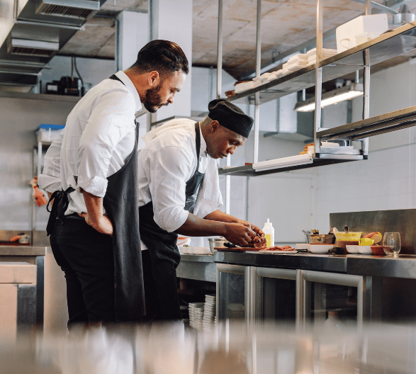 Chef and Sous Chef Working in the Kitchen
