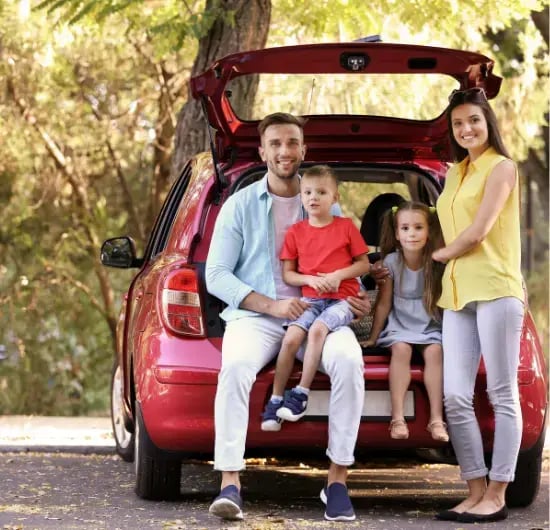 Family sitting in their car (1)