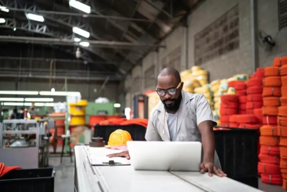 Man in factory with a business loan  (2) (1)