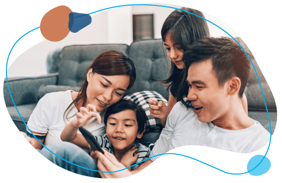 family looking onto dads cell phone