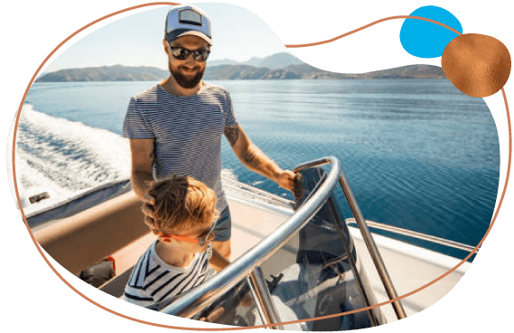 father with son in boat