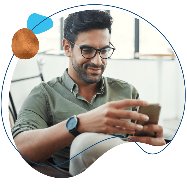 man on cell phone entering a mobile deposit