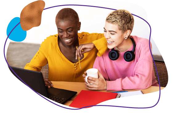 partners on laptop applying for skip a pay while drinking coffee