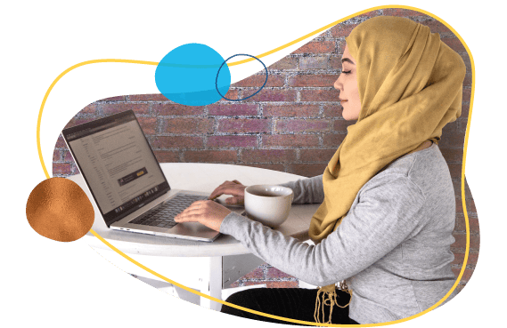 woman on laptop with coffee