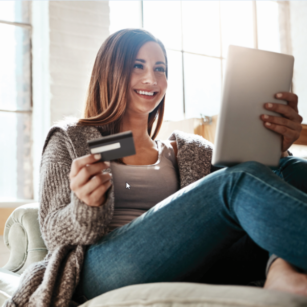 Woman using an iPad to open a checking account