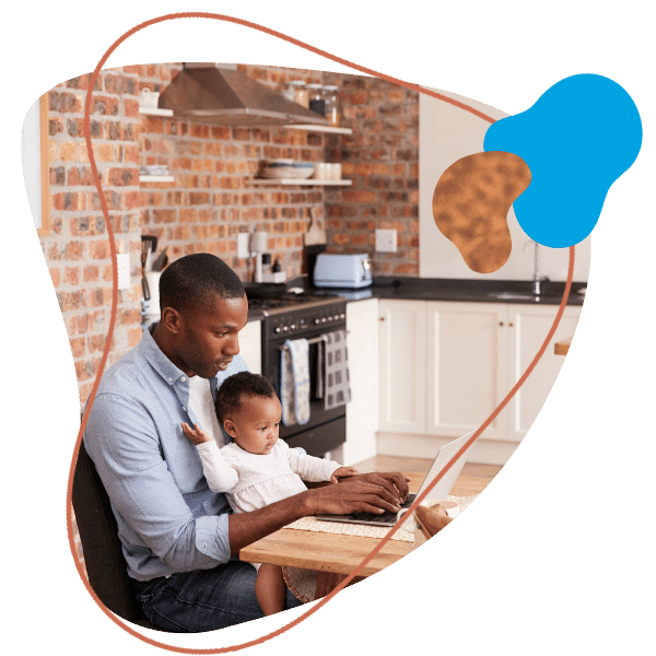 father and young daughter using laptop