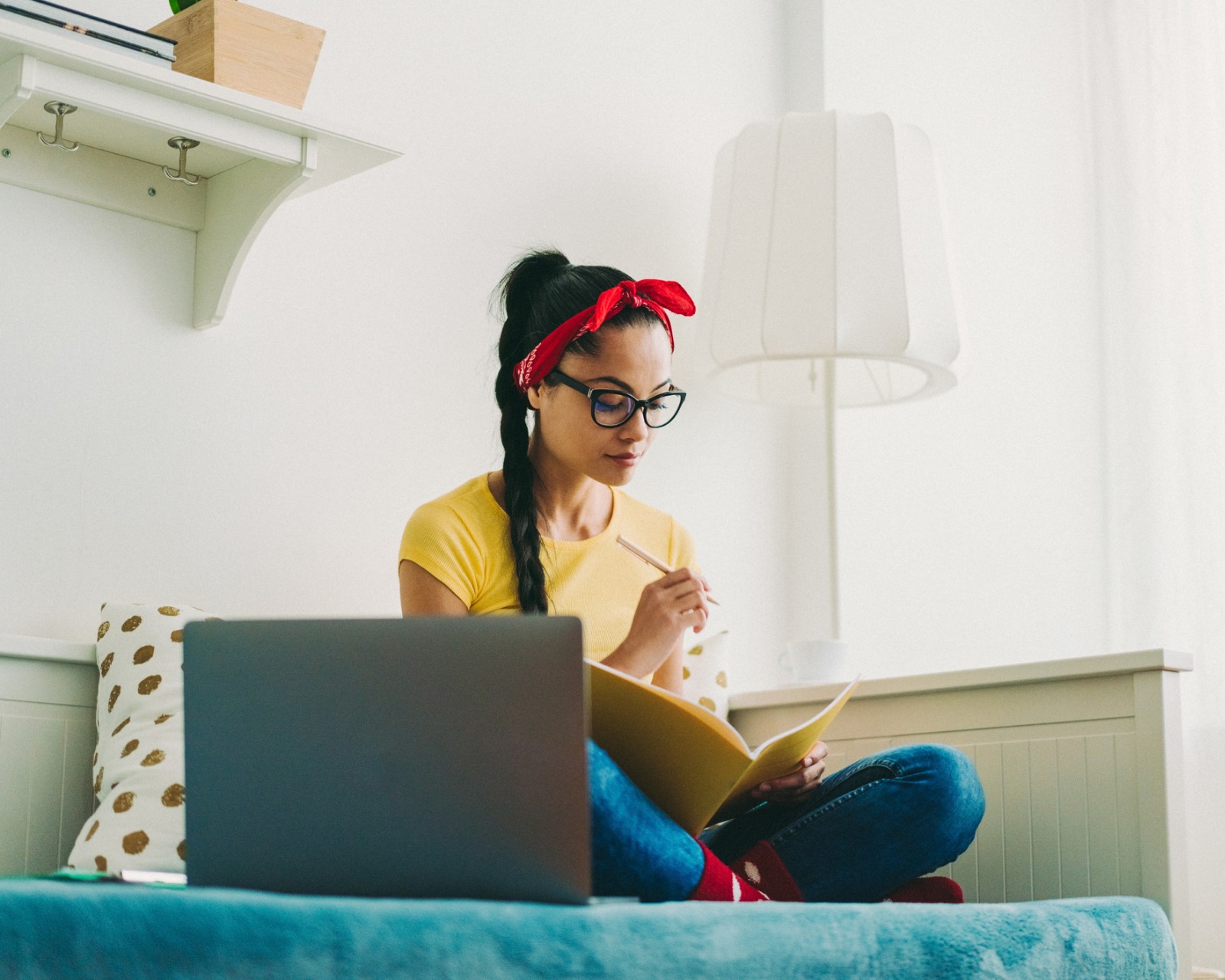 college student budgeting on computer