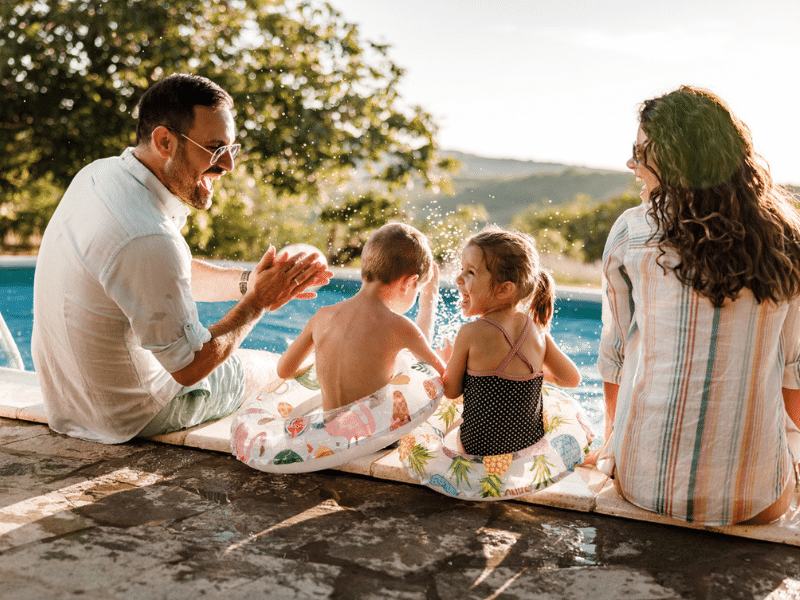 Family by their pool