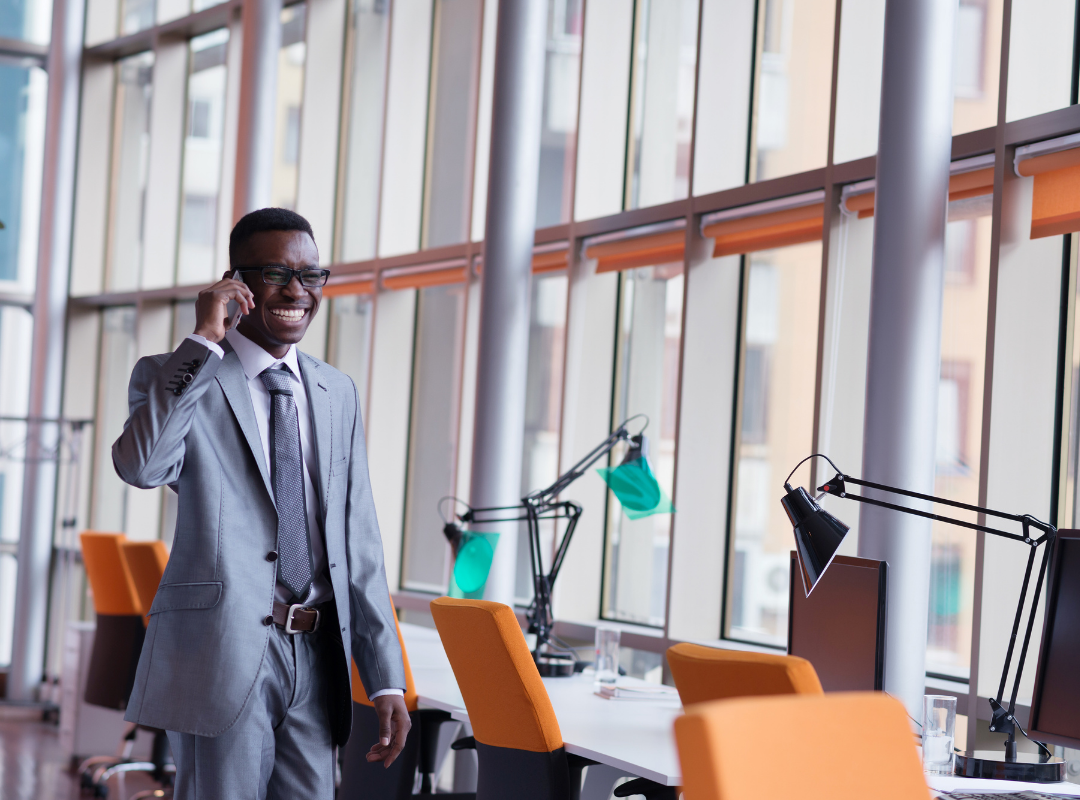 credit counselor smiling on phone