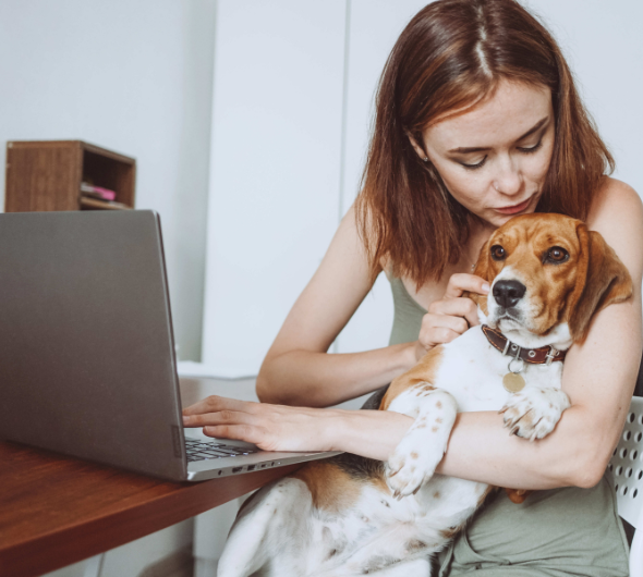 woman-filing-her-taxes-with-pup