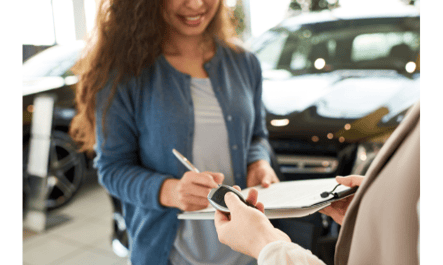 woman-signing-for-auto-loan