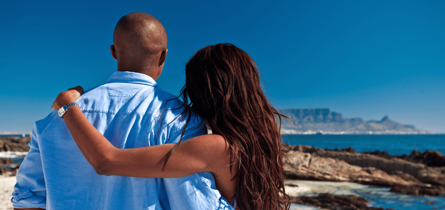 couple-enjoying-vacation-at-the-beach