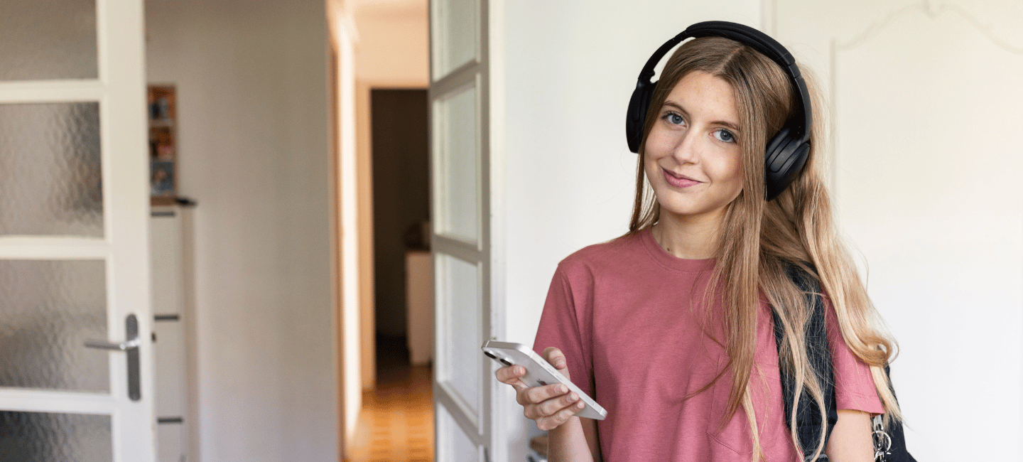 teenage-girl-listening-to-music-with-phone