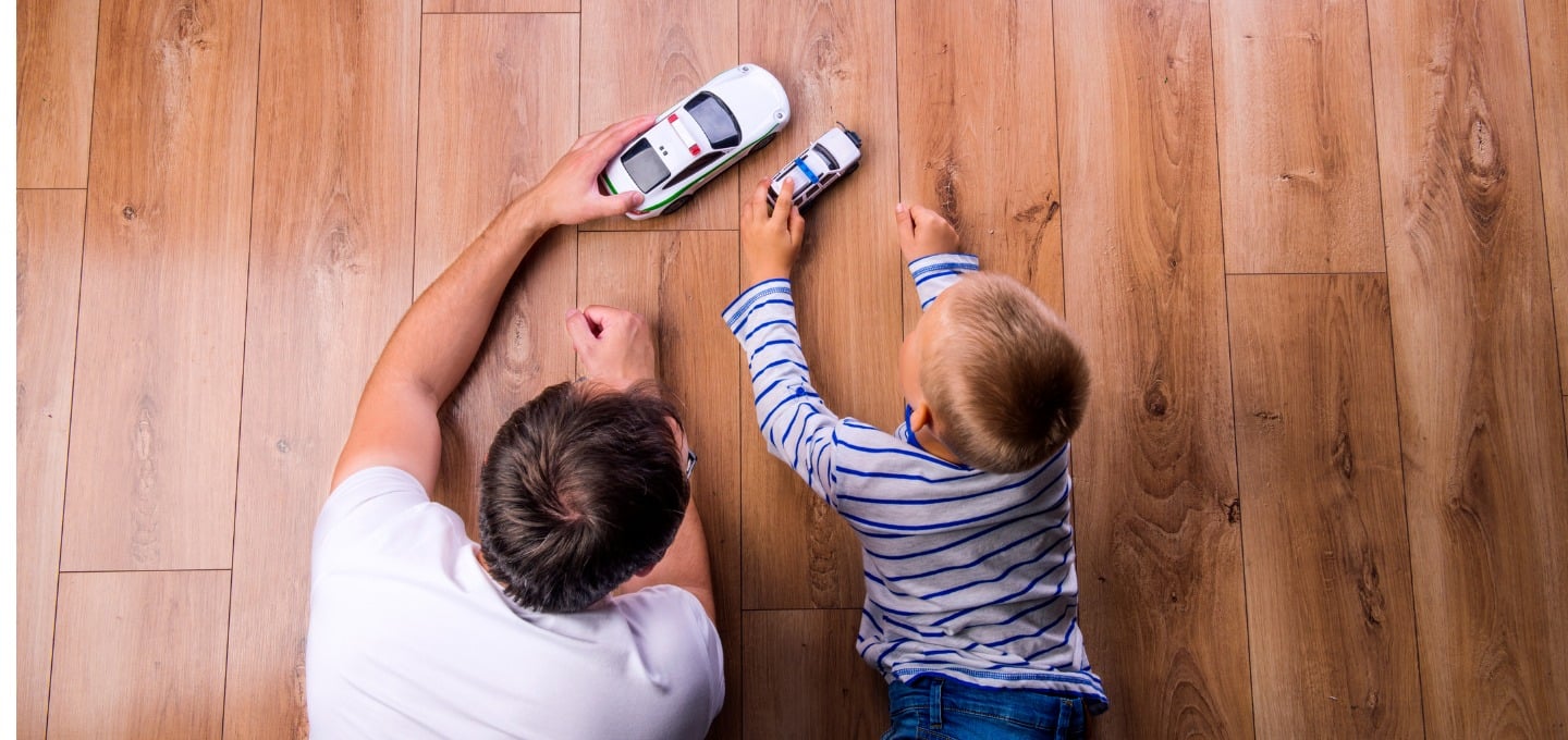 father-son-playing-with-cars