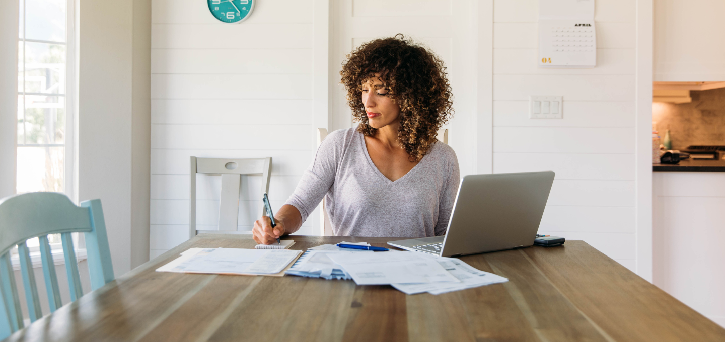 woman-filing-taxes-from-home