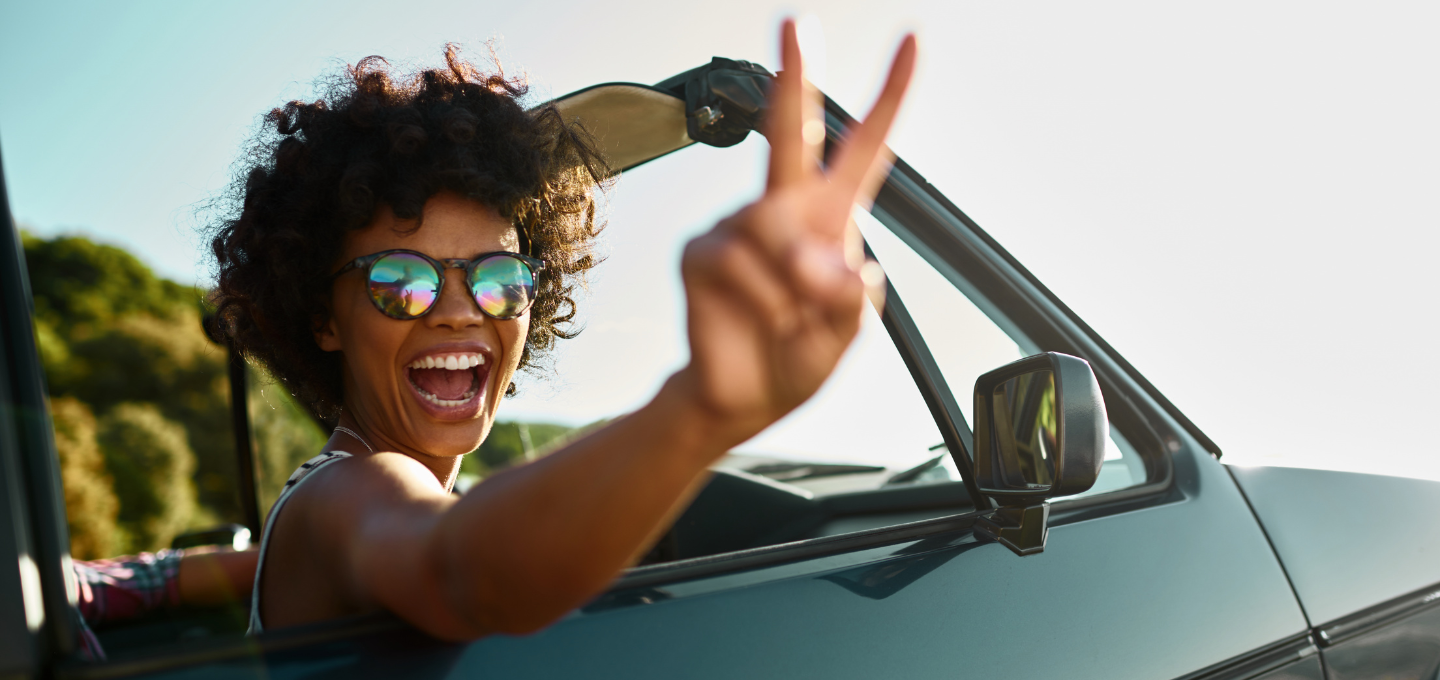 woman smiling in car